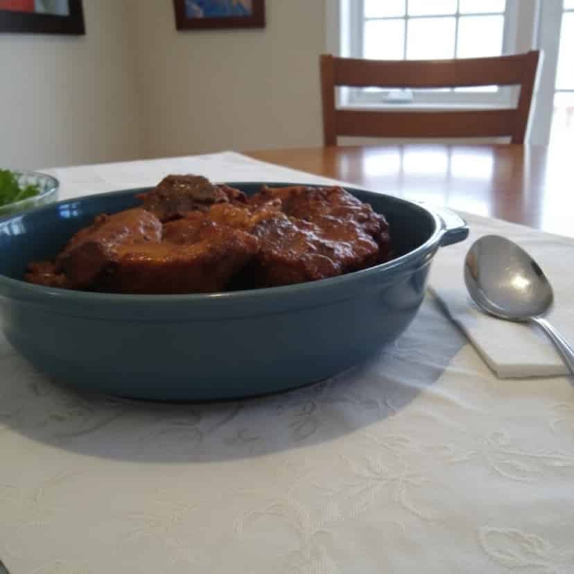 Pernil ao molho de cebola