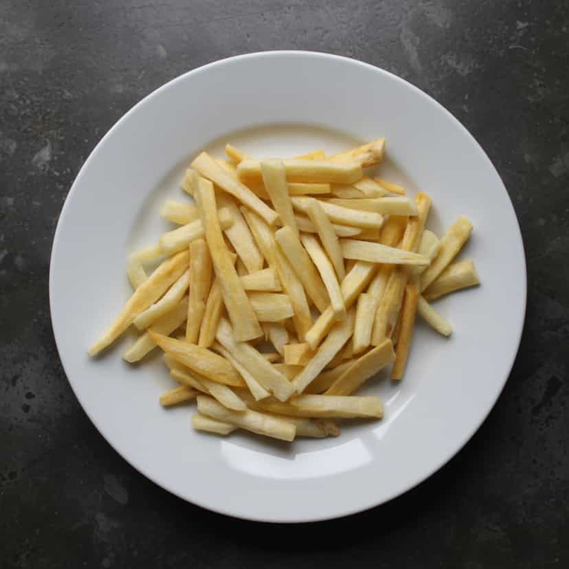 Foto deliciosa de Aipim Crocante em Palitos pronta para servir - Chips & Biscoitos