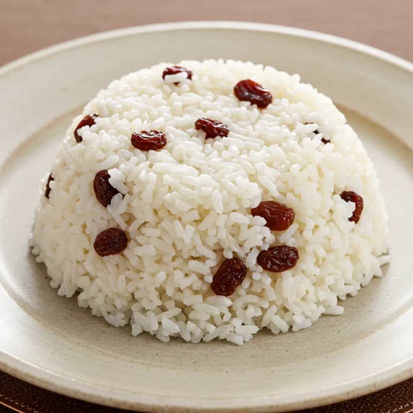 Foto deliciosa de Arroz com Laranja e Passas pronta para servir - Almoço & Jantar