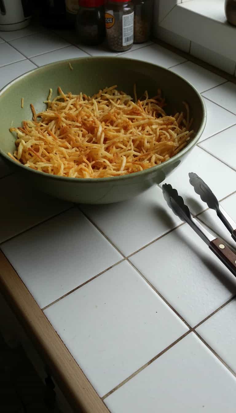 Foto deliciosa de Batata palha caseira pronta para servir - Chips & Biscoitos