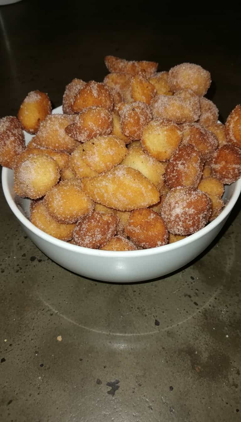 Foto deliciosa de Bolinhos de Chuva Deliciosos pronta para servir - Lanches de Padaria