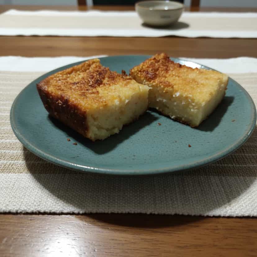 Foto deliciosa de Bolo de Aipim Cremoso com Coco pronta para servir - Bolos & Cupcakes