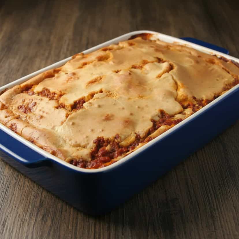 Foto deliciosa de Bolo Salgado de Sardinha pronta para servir - Lanches de Padaria