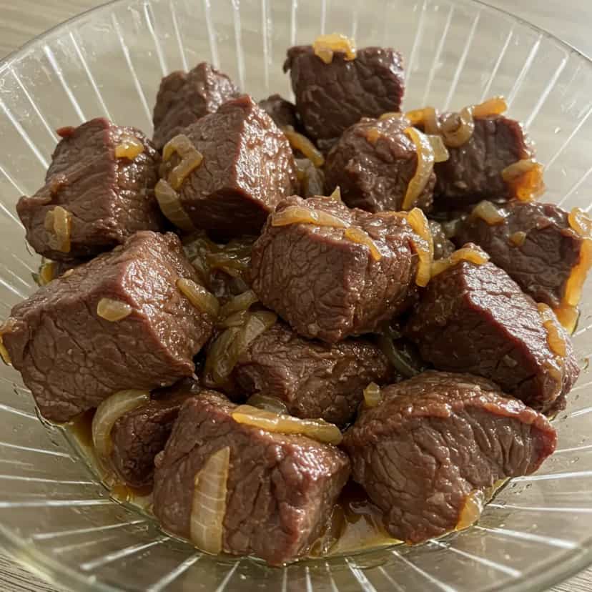 Foto deliciosa de Costelinha de Javali Acebolada pronta para servir - Carnes & Frango