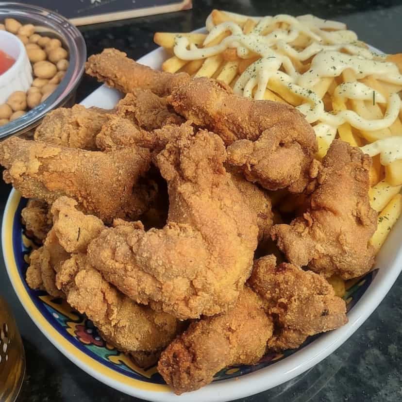 Foto deliciosa de Coxinha da Asa Empanada pronta para servir - Salgadinhos