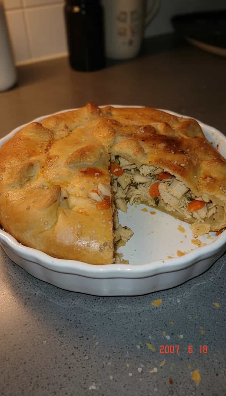 Foto deliciosa de Empadão de Frango pronta para servir - Carnes & Frango