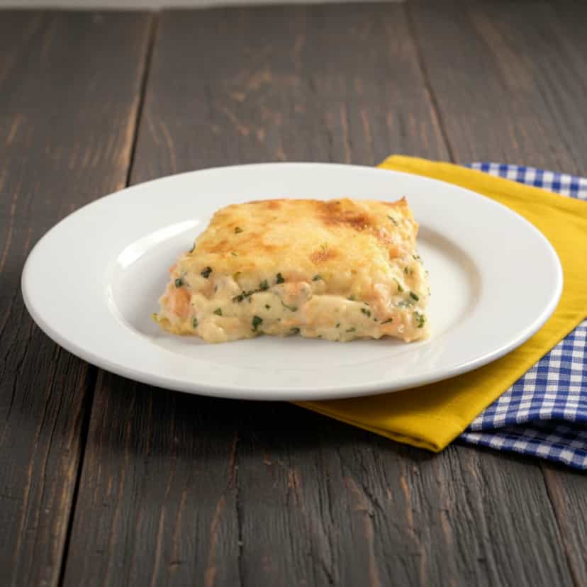 Foto deliciosa de Escondidinho de Camarão Cremoso pronta para servir - Peixes & Frutos do Mar
