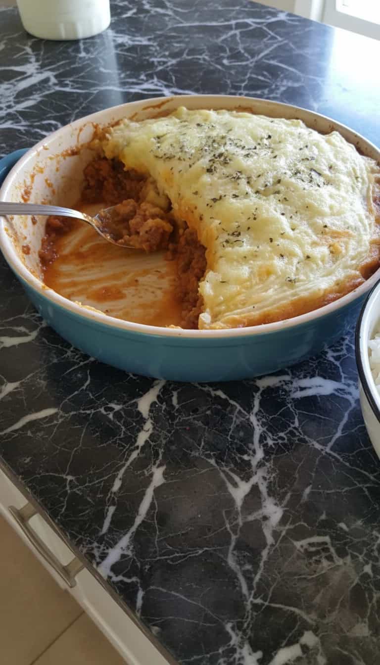 Foto deliciosa de Escondidinho de Camarão cremoso pronta para servir - Peixes & Frutos do Mar