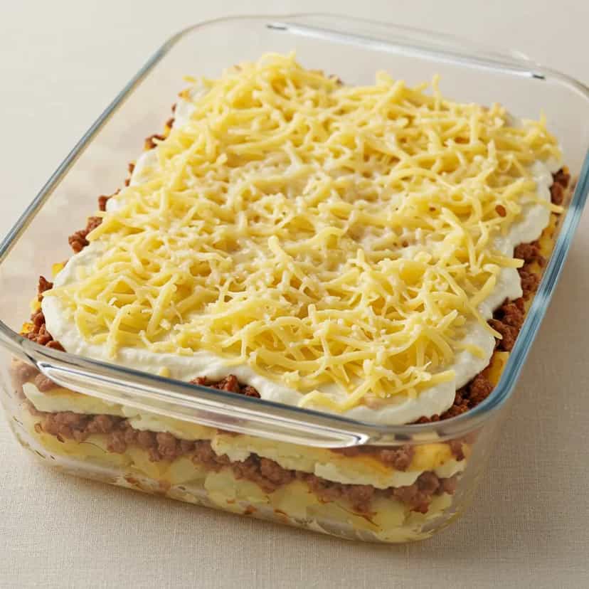 Foto deliciosa de Escondidinho de Carne Moída pronta para servir - Carnes & Frango