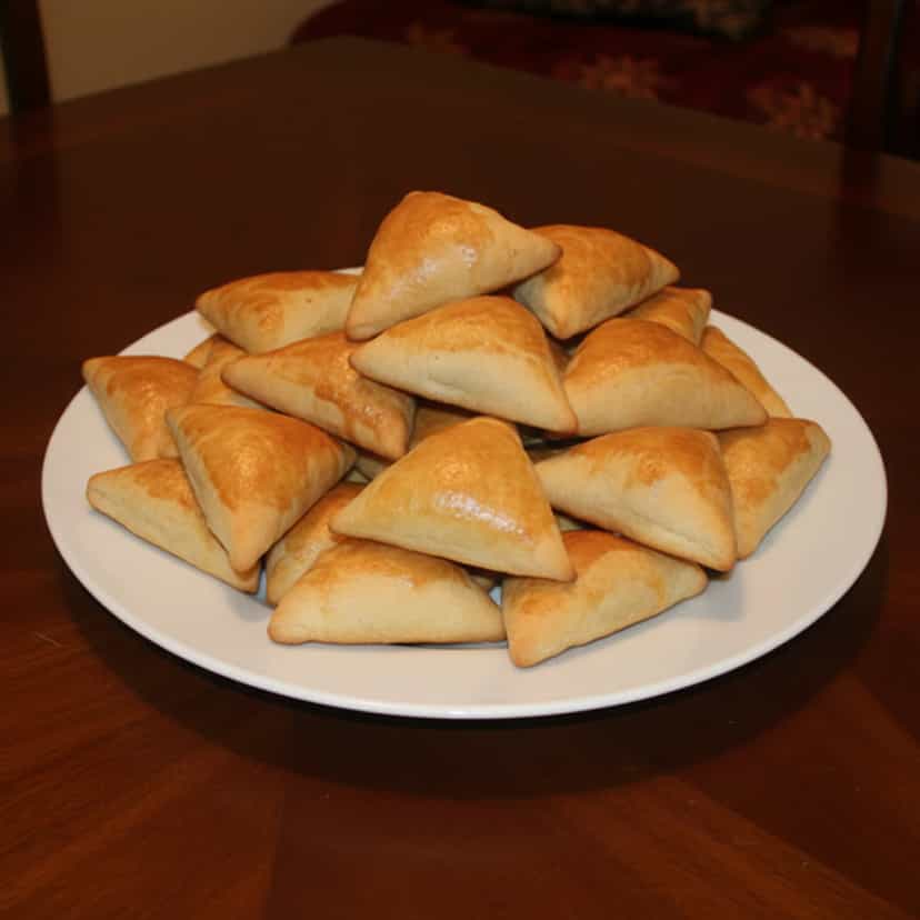 Foto deliciosa de Esfirra da Elena pronta para servir - Lanches de Padaria