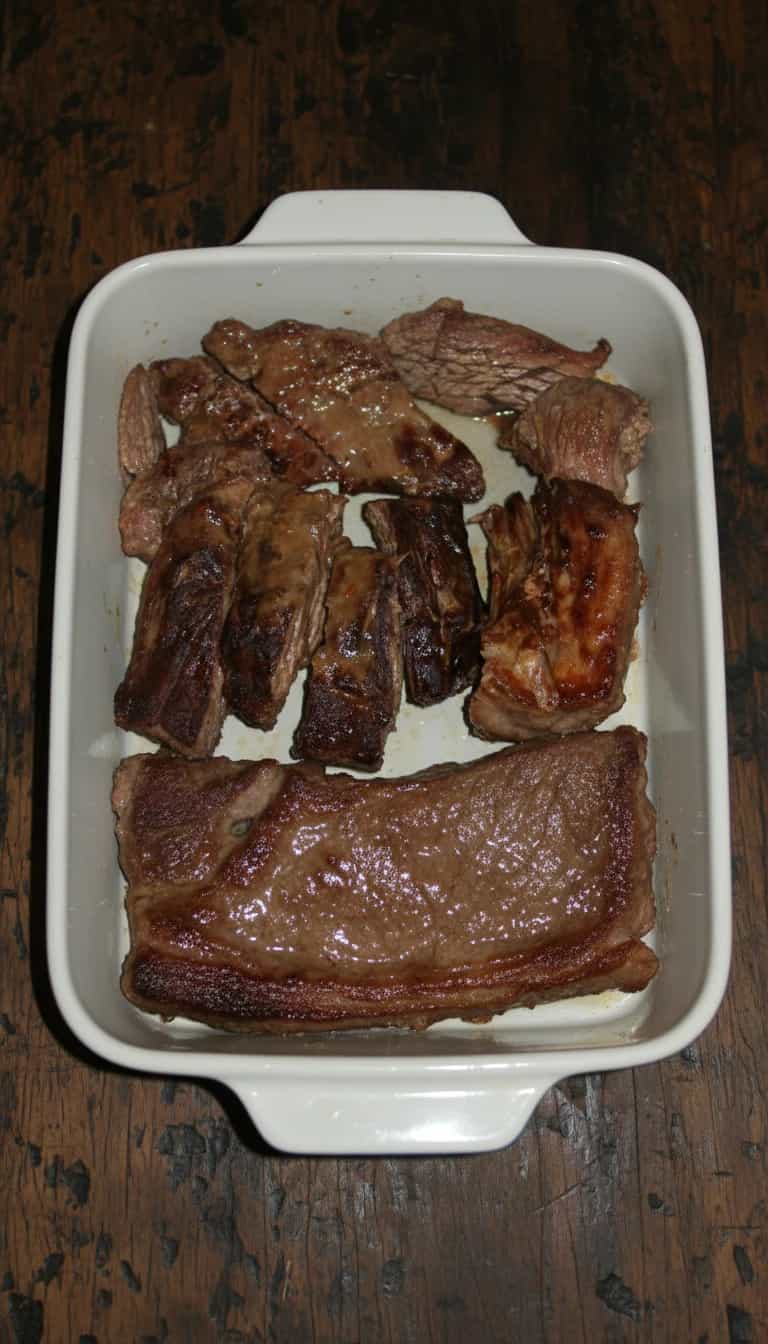 Foto deliciosa de Fraldinha Assada ao Molho Madeira pronta para servir - Carnes & Frango