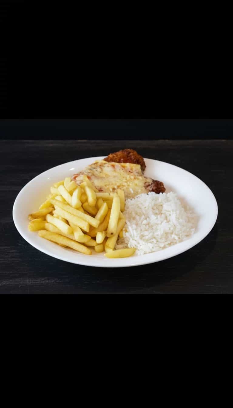 Foto deliciosa de Frango à Parmegiana com Presunto pronta para servir - Carnes & Frango
