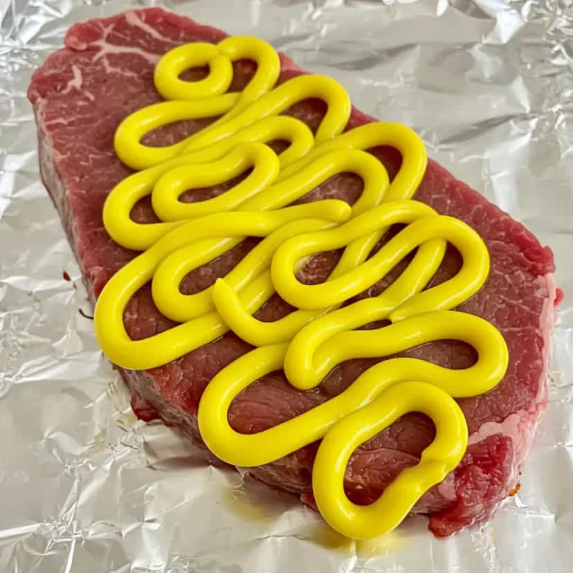 Foto deliciosa de Maminha ao Molho de Cheddar pronta para servir - Carnes & Frango