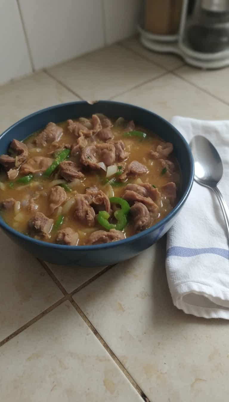 Foto deliciosa de Moela ao Molho de Cerveja Preta pronta para servir - Carnes & Frango