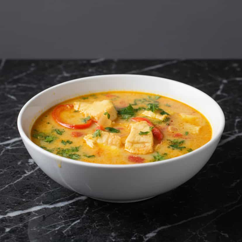 Foto deliciosa de Moqueca Capixaba de Cherne pronta para servir - Peixes & Frutos do Mar