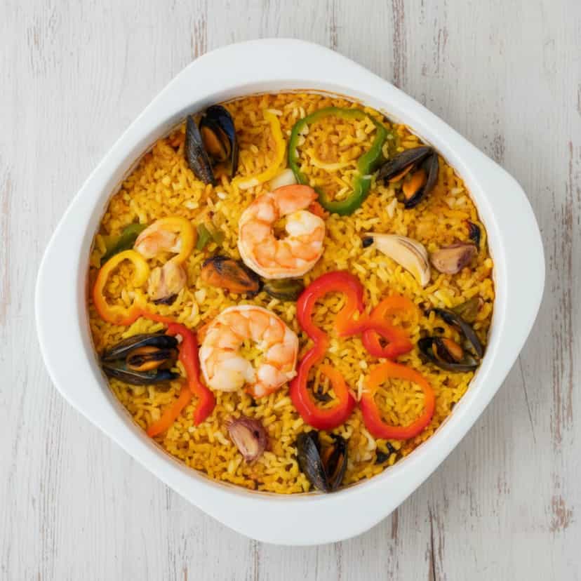 Foto deliciosa de Moqueca Capixaba de Robalo pronta para servir - Peixes & Frutos do Mar