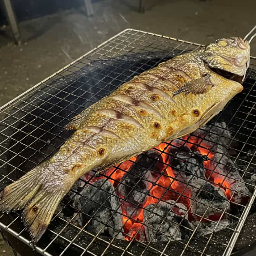 Foto deliciosa de Pacu Assado na Brasa pronta para servir - Peixes & Frutos do Mar