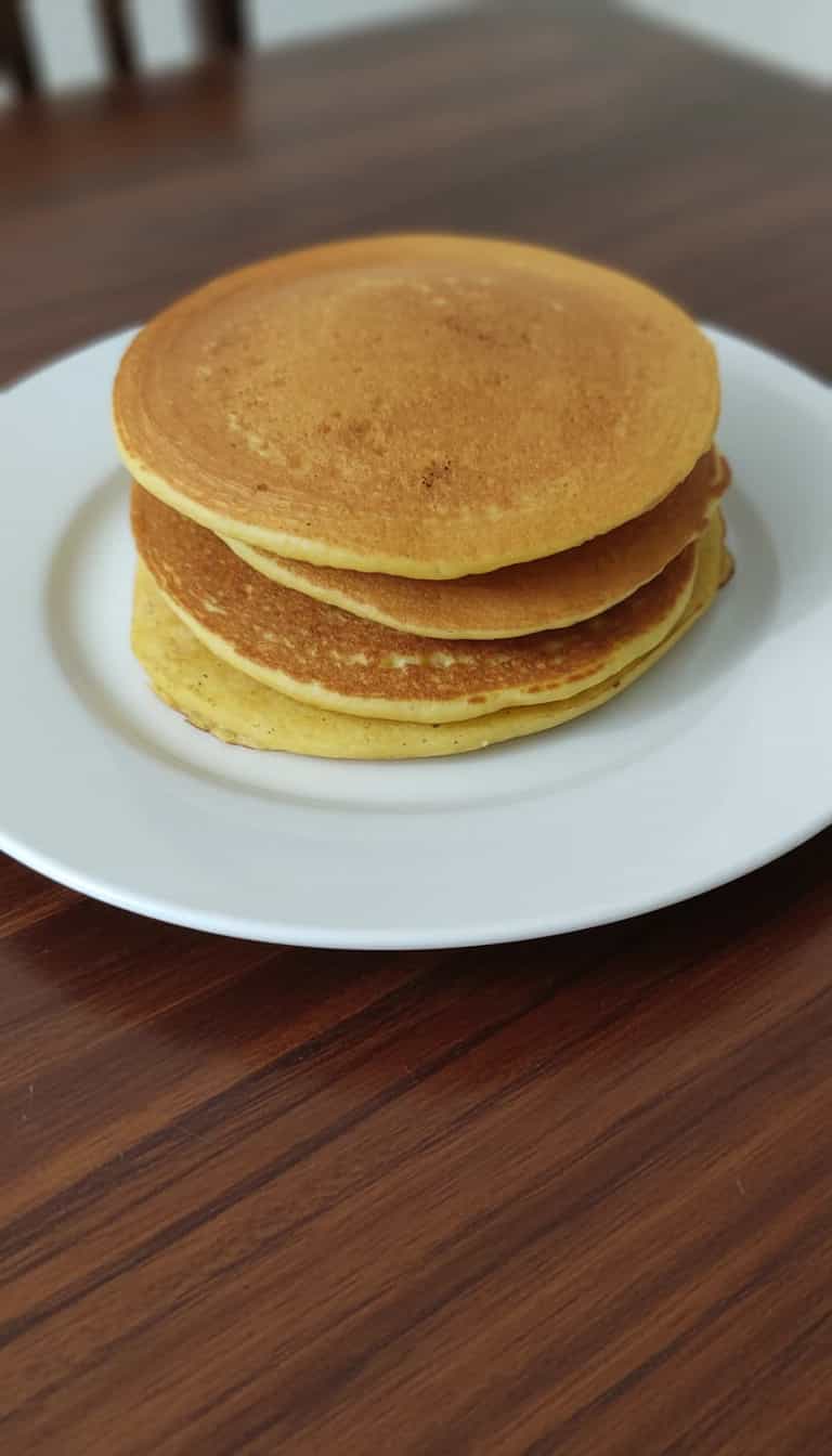 Foto deliciosa de Panquecas de Fubá pronta para servir - Panquecas & Waffles