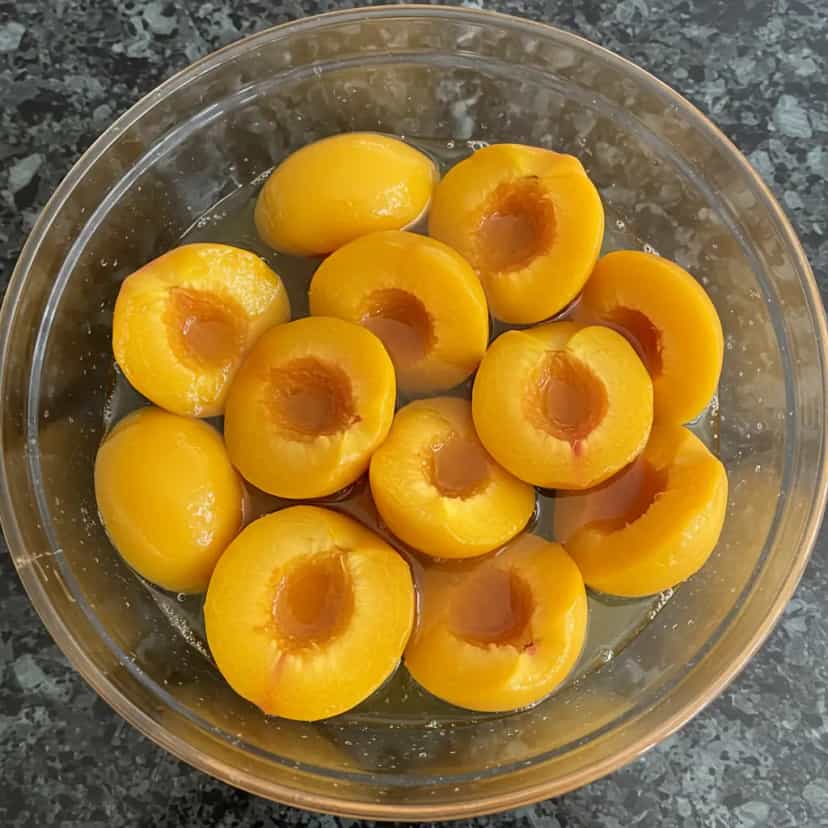 Foto deliciosa de Pêssegos em Calda Caseira pronta para servir - Outras Receitas