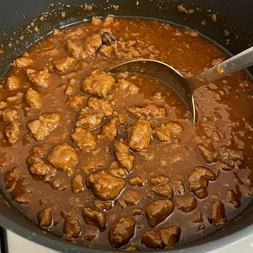 Foto deliciosa de Picadinho de Carne ao Molho de Tomate pronta para servir - Carnes & Frango