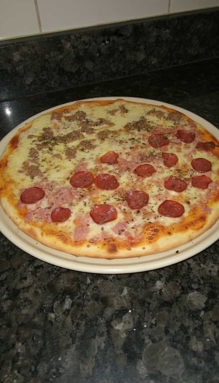 Foto deliciosa de Pizza de Batata Caseira pronta para servir - Pizzas & Salgados