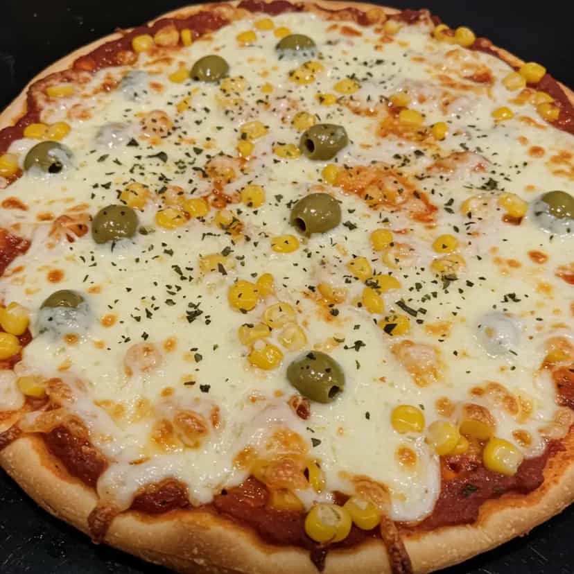 Foto deliciosa de Pizza de Carne Seca com Banana pronta para servir - Pizzas & Salgados