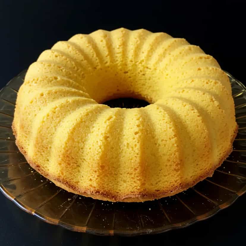 Foto deliciosa de Quindim Tradicional pronta para servir - Pudins & Cremes
