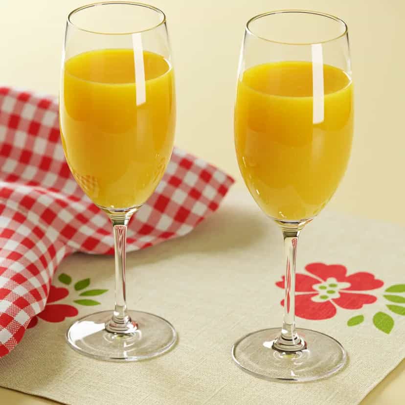 Foto deliciosa de Suco de Laranja e Kiwi Refrescante pronta para servir - Sucos & Smoothies