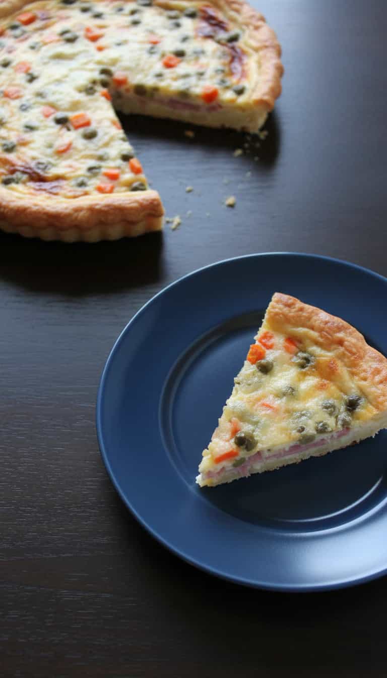 Foto deliciosa de Torta de Presunto e Mussarela pronta para servir - Salgadinhos