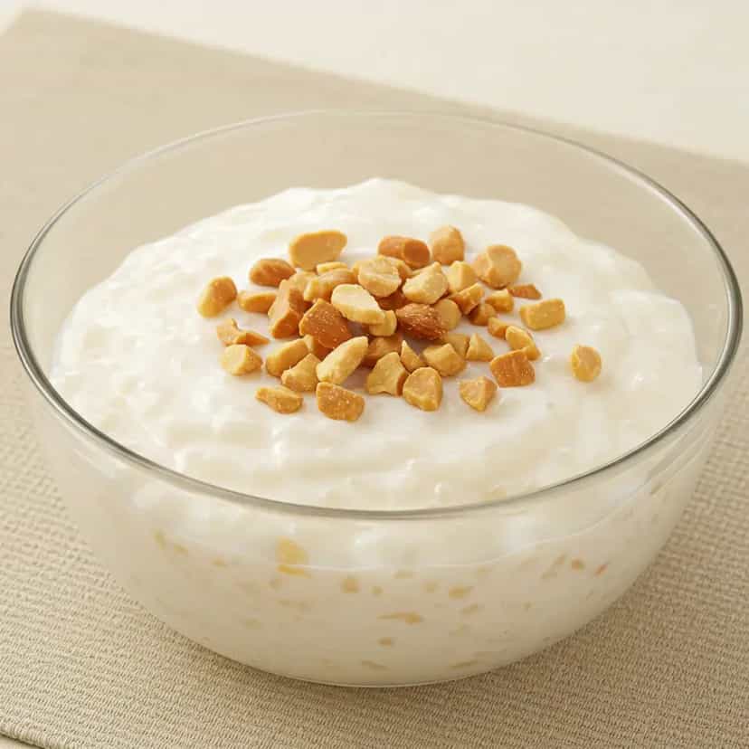 Foto deliciosa de Arroz-doce cremoso com Cardamomo e Amêndoas pronta para servir - Pudins & Cremes