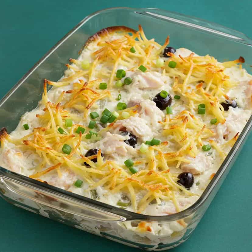 Foto deliciosa de Bacalhau com Natas e Batata Palha pronta para servir - Peixes & Frutos do Mar