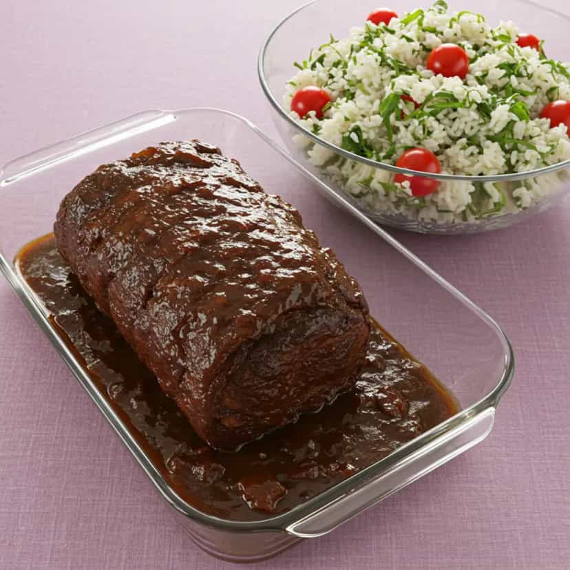 Foto deliciosa de Lombo de Porco ao Molho de Ameixa com Arroz de Couve pronta para servir - Carnes & Frango