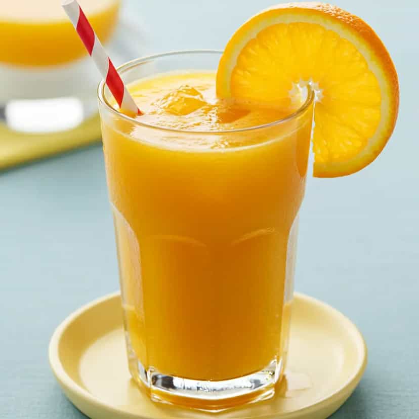 Foto deliciosa de Suco Tropical Refrescante: Laranja, Abacaxi e Maçã pronta para servir - Sucos & Smoothies